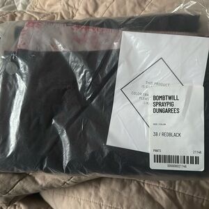 New sealed package outlier nyc bombtwill spraypig dungarees in red black.